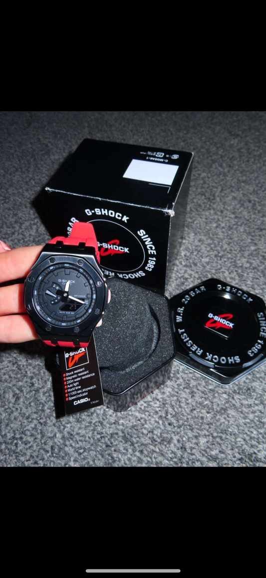 CASIOAK MOD WATCH BLACK CASE, RED RUBBER STRAP, BLACK SILVER TIME MARK WITH A BLACK DIALS 44MM